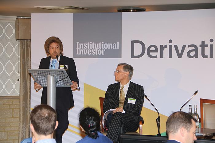 Dr George Namur, left, and Dr Pete Clark, right, discussing acquisitions on stage at the 2019 Derivatives Summit.