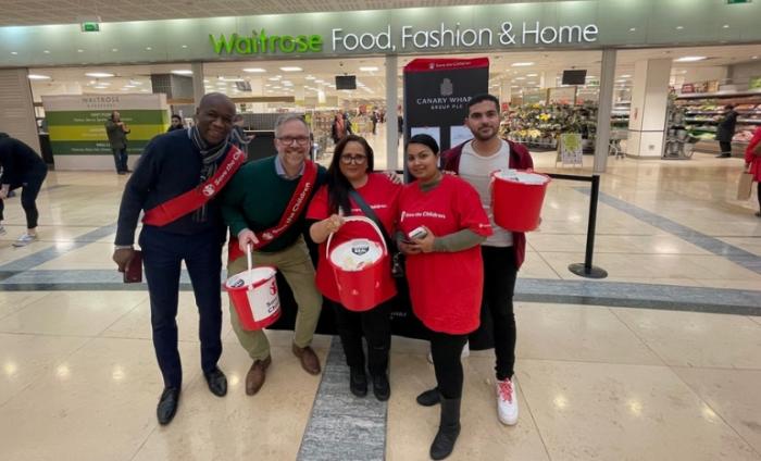 Tim and volunteers outside Waitrose with donation buckets. 