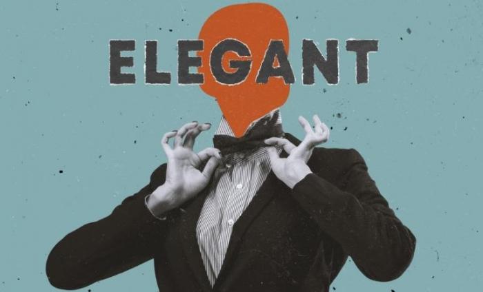 Photo of a woman in a tuxedo with the word "elegant" written over the top to play on gender stereotypes